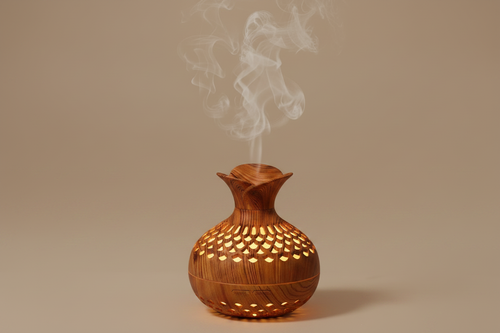 Sacred Mist Aromatherapy Diffuser on warm beige background